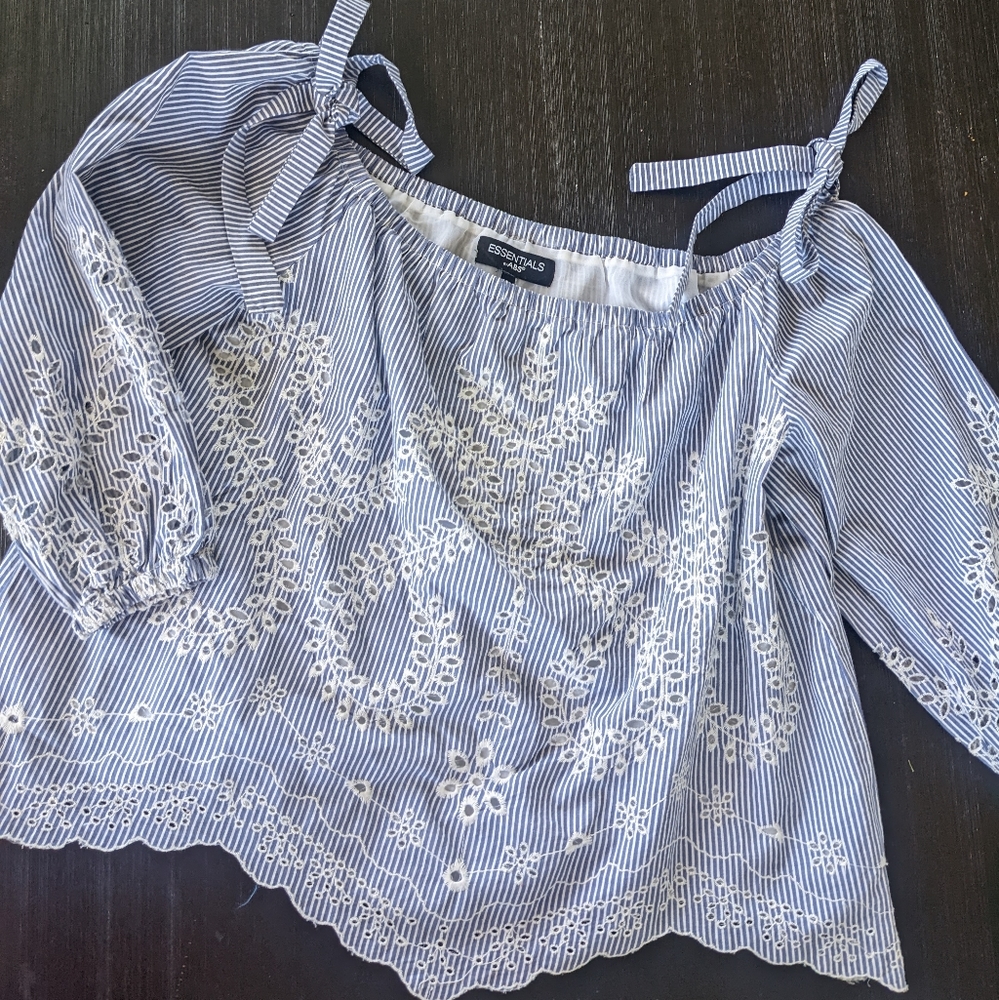 Embroidered blouse with hole details and ribbon/bow shoulder detailing